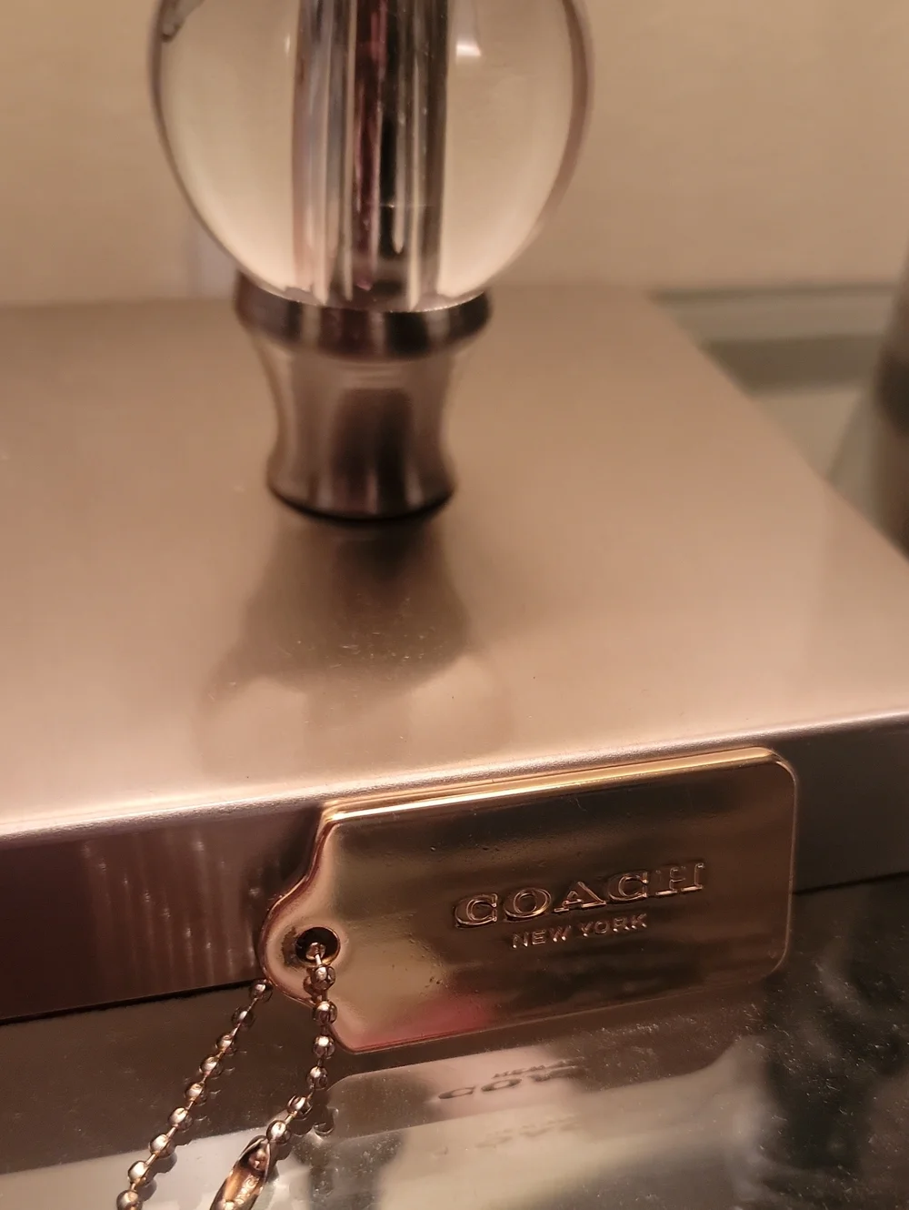 COACH CHARM NEW YORK. GOLD BRASS, THICK METAL FOB BAG KEYCHAIN HANG TAG.